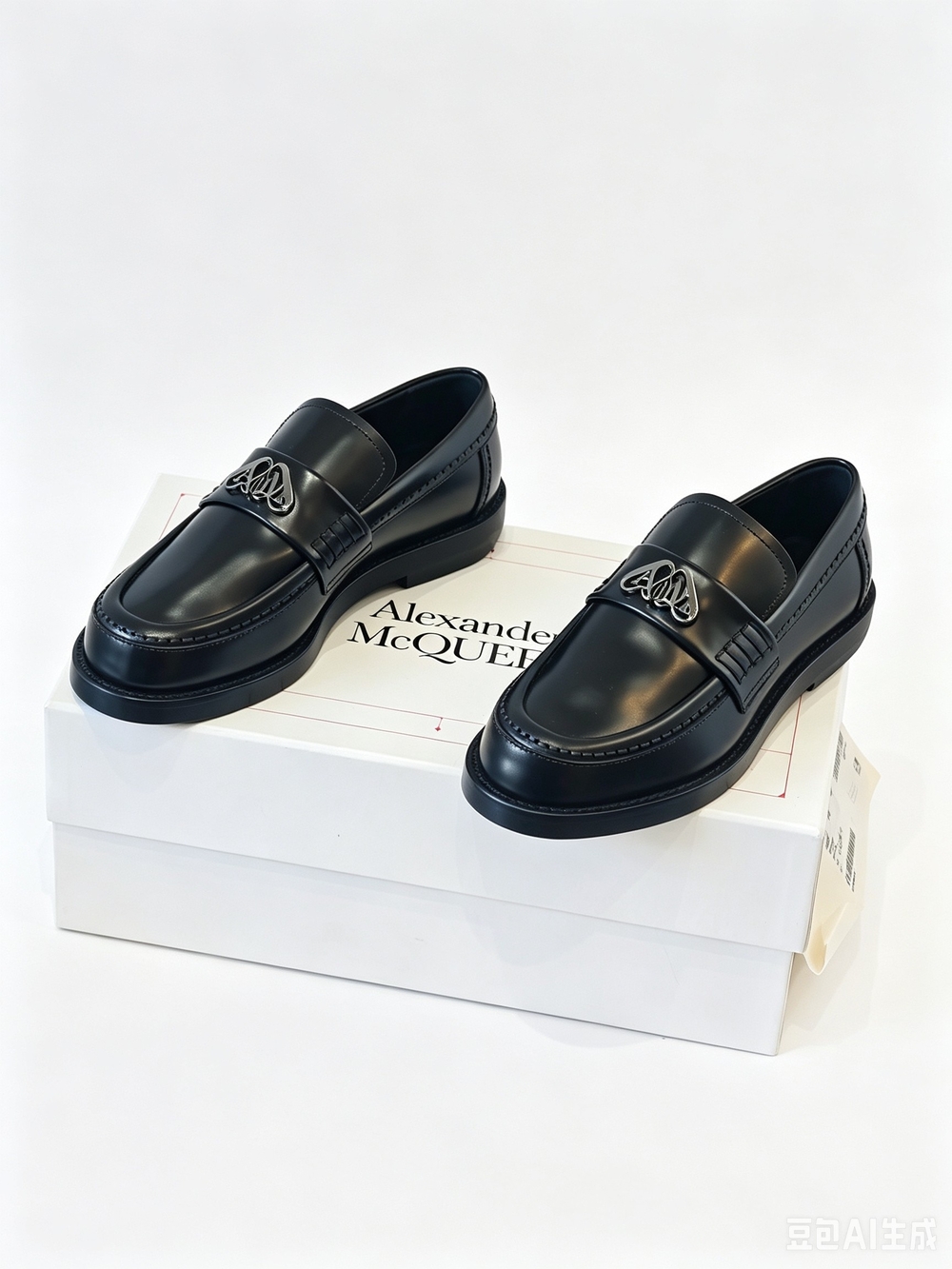 Alexander McQueen black leather loafers i